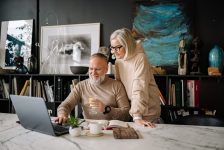 Couple looking at laptop